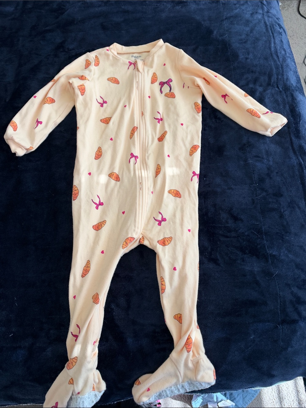 Cream Footed One-Piece with Orange Croissant and Pink Bow Prints